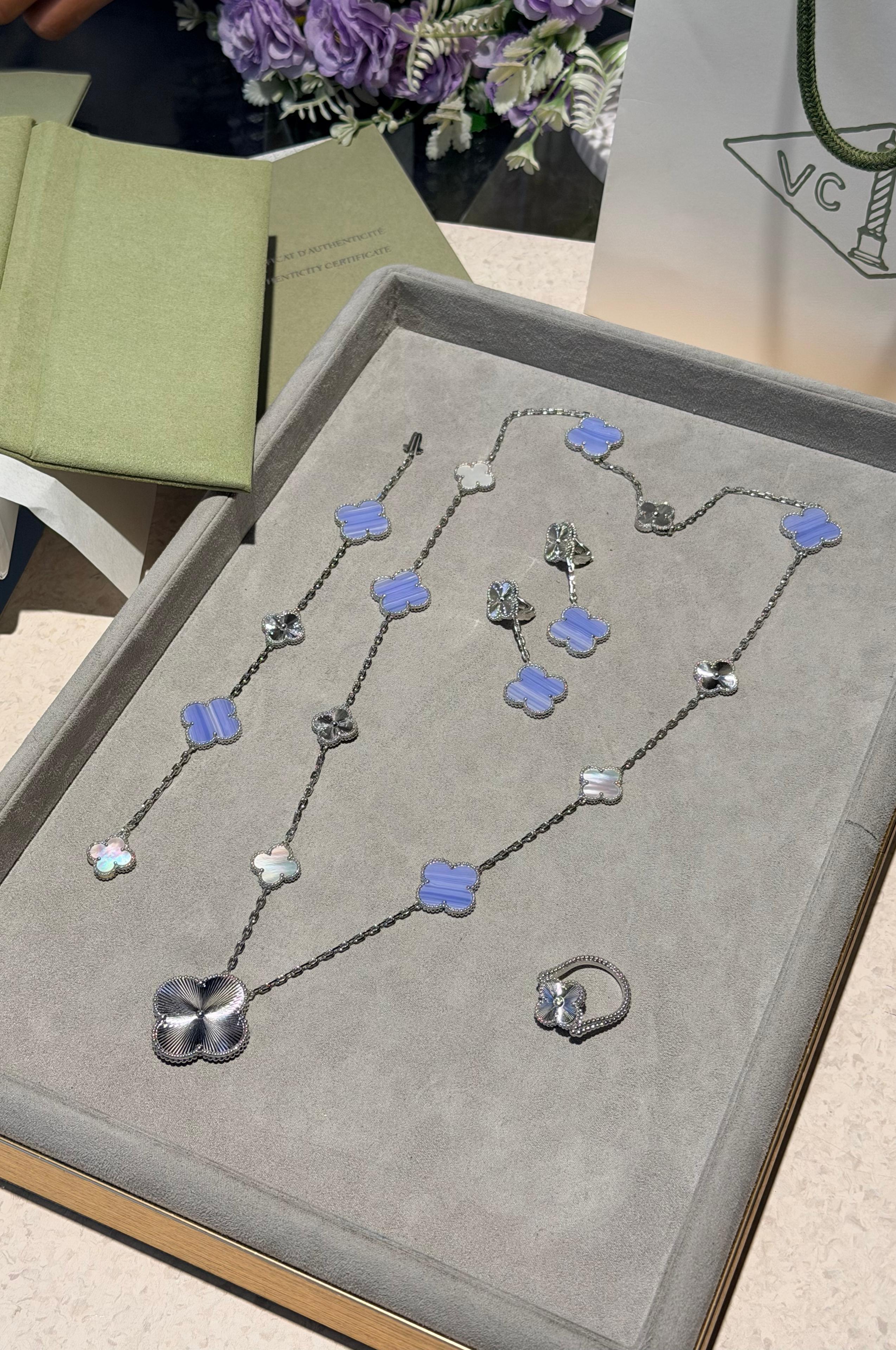 Van Cleef & Arpels Magic Alhambra transformable long necklace, 15 motifs , Earings &  Ring Full Set.