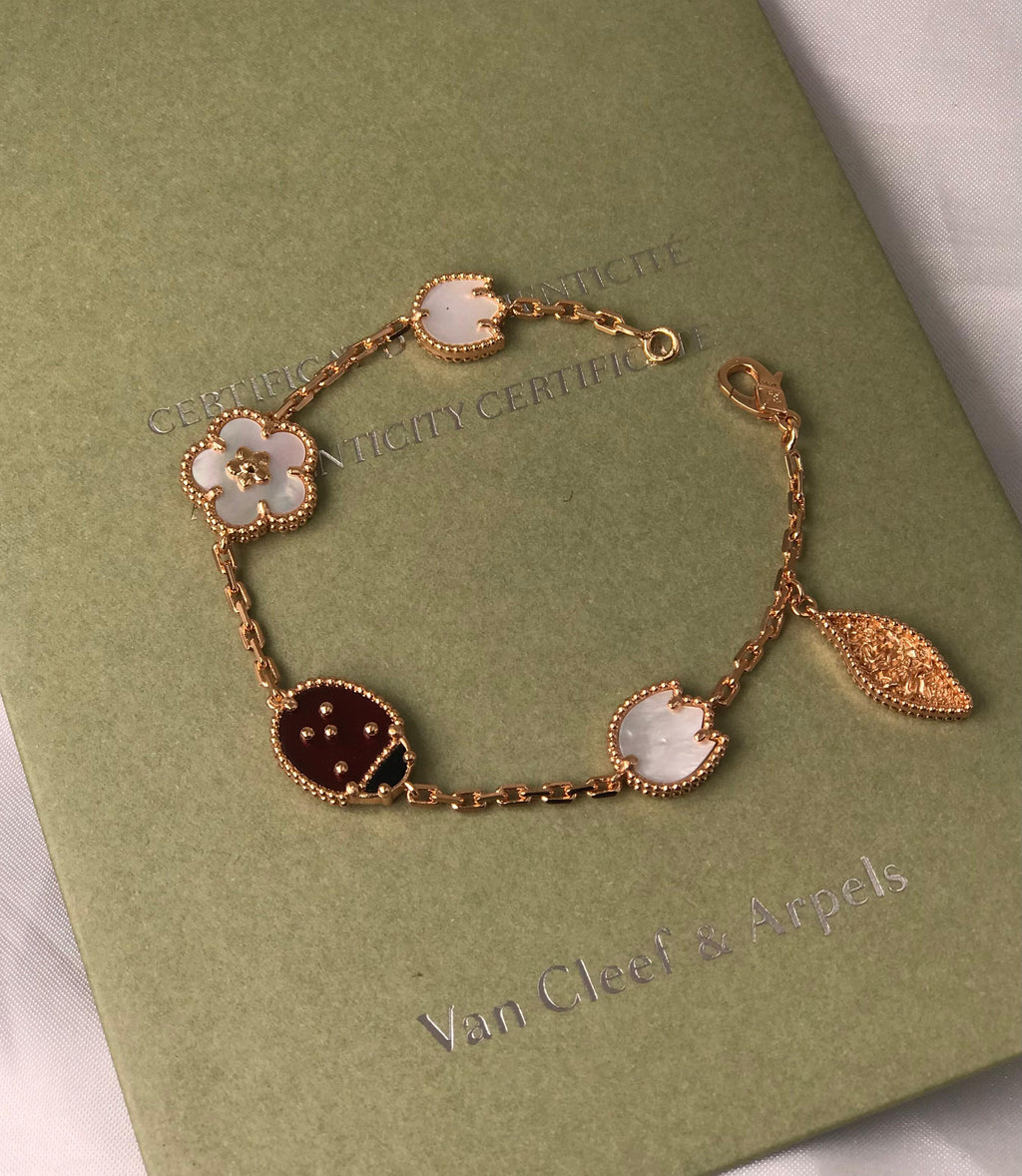 VanCleef & Arpels   Lucky Spring long necklace 15 motifs & 1  Motif earrings with Bracelet & Ring