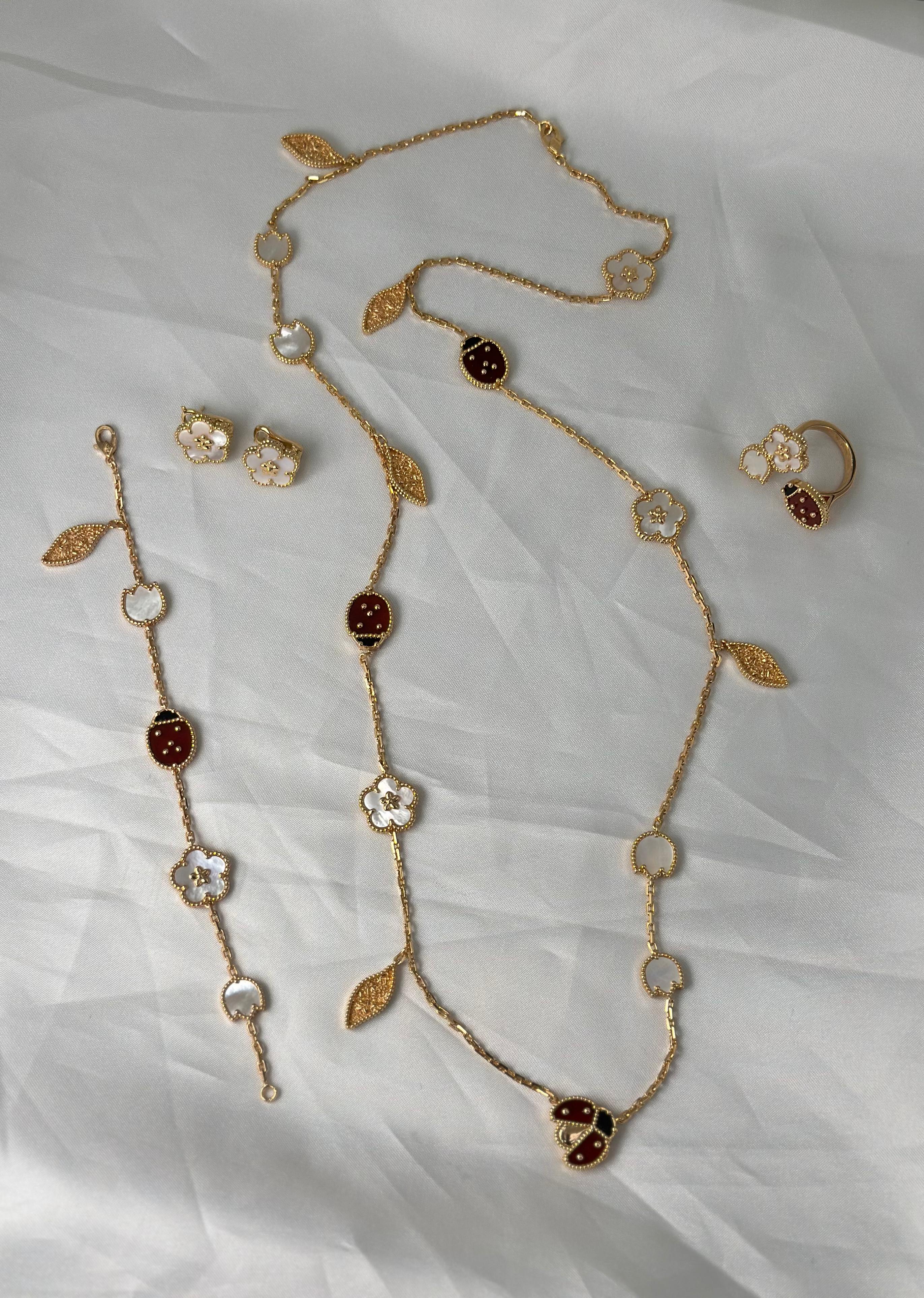 VanCleef & Arpels   Lucky Spring long necklace 15 motifs & 1  Motif earrings with Bracelet & Ring